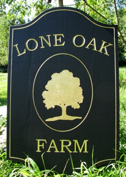 Custom farm sign with gold leaf letters